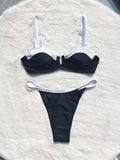 Women's black low waist bikini swimsuit with stitching detail and split brief design