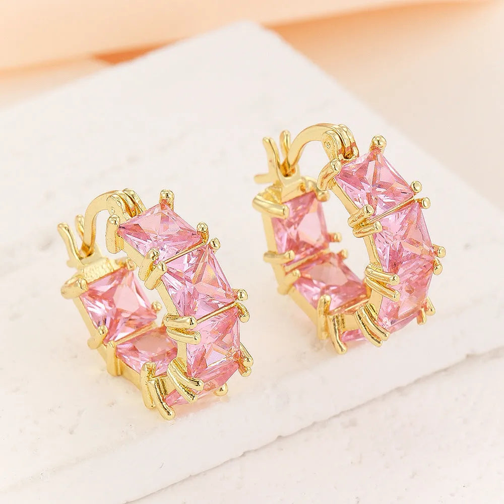 Geometric U-shaped women's earrings with round zircon elements and gold electroplated finish