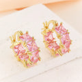 Geometric U-shaped women's earrings with round zircon elements and gold electroplated finish