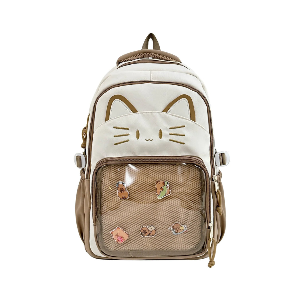 Korean cartoon large capacity nylon backpack in pink colour with badge pendant.