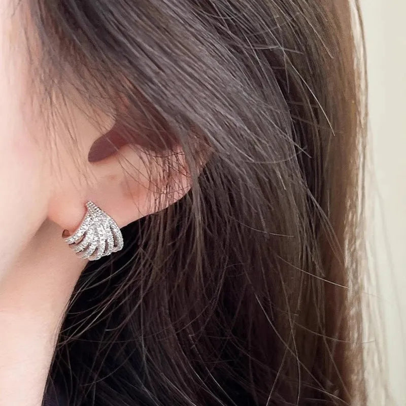 Women's geometric zircon earrings with platinum electroplating and line design