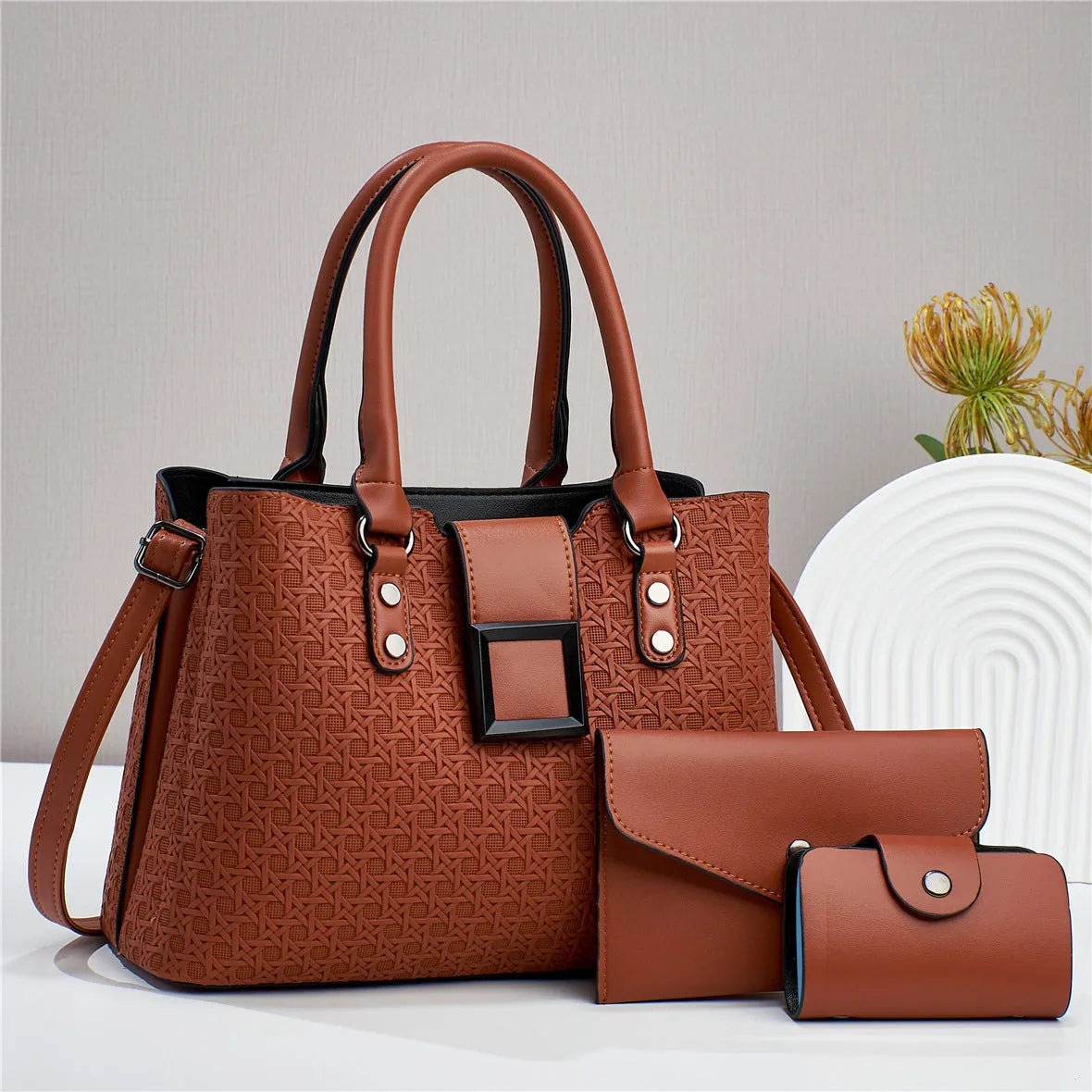 Three-piece women's crossbody bag in textured PU with square shape and open pocket