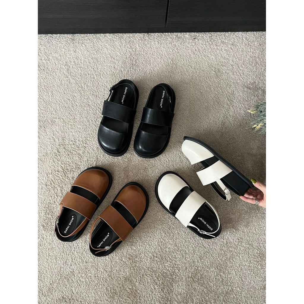 Retro sandals with closed toe design and adjustable ankle-strap buckle in apricot colour