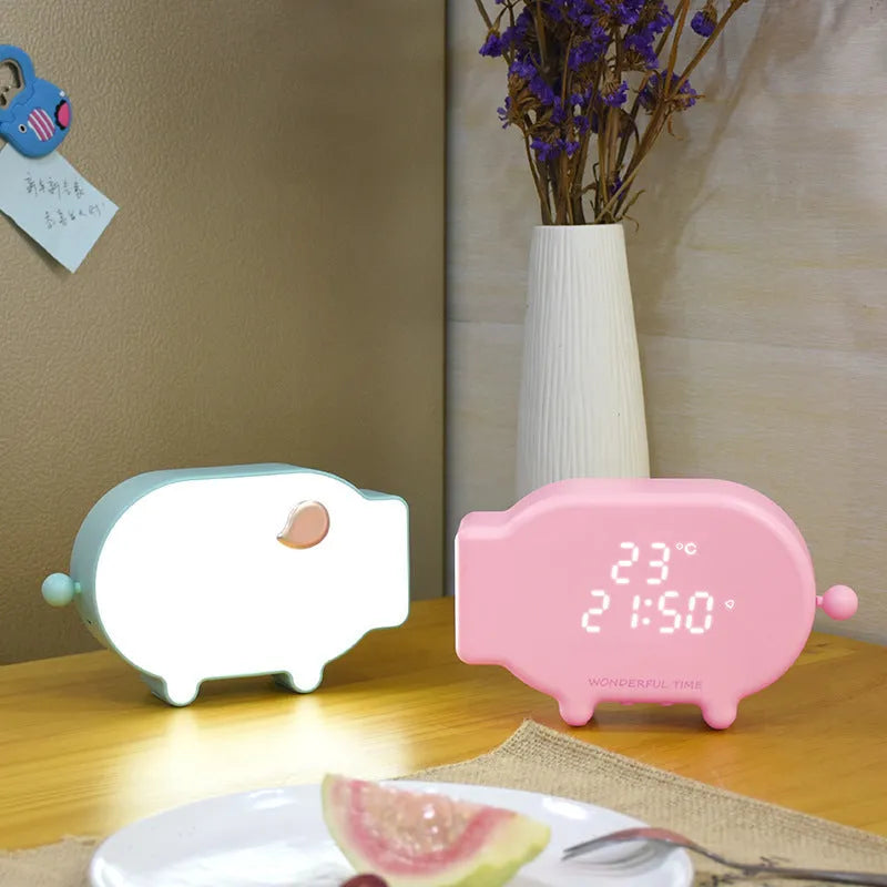 Blue multifunctional LED alarm clock showing time and temperature with USB charging cable