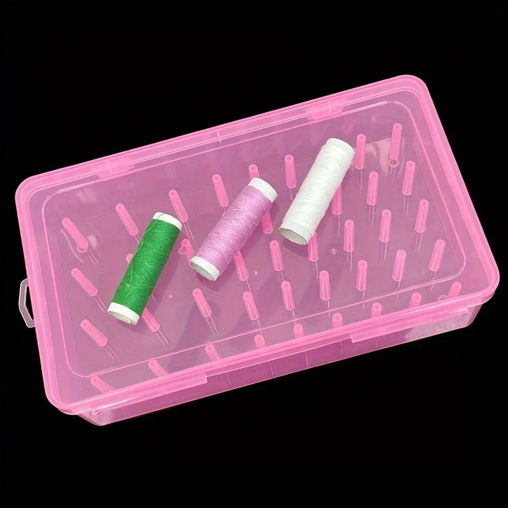 Transparent plastic storage box with 42 small compartments for organising embroidery thread.