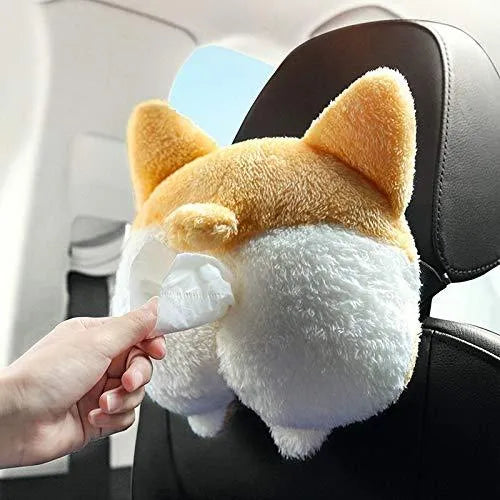 Yellow corgi butt-shaped polyester tissue box cover hanging on a car sun visor.