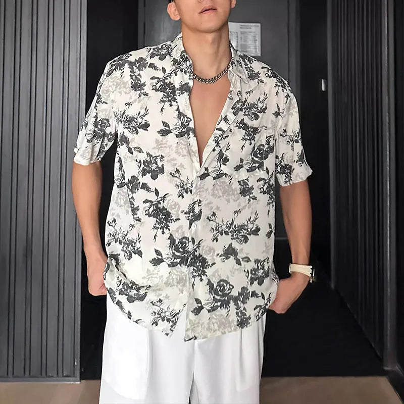 Loose casual short sleeve shirt with floral pattern in black or white colour options