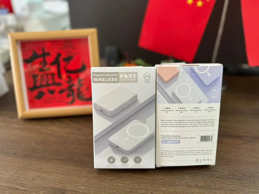 White magnetic wireless power bank with stand functionality showing 5000mAh capacity