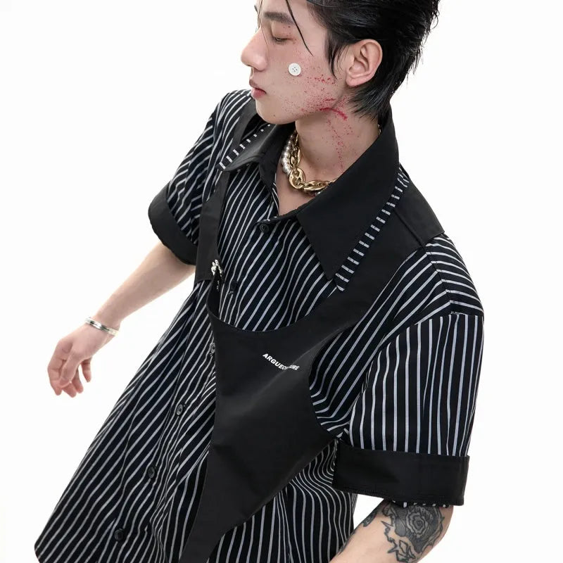 Man wearing a black and white striped cotton shirt with a distinctive double collar and short sleeves.