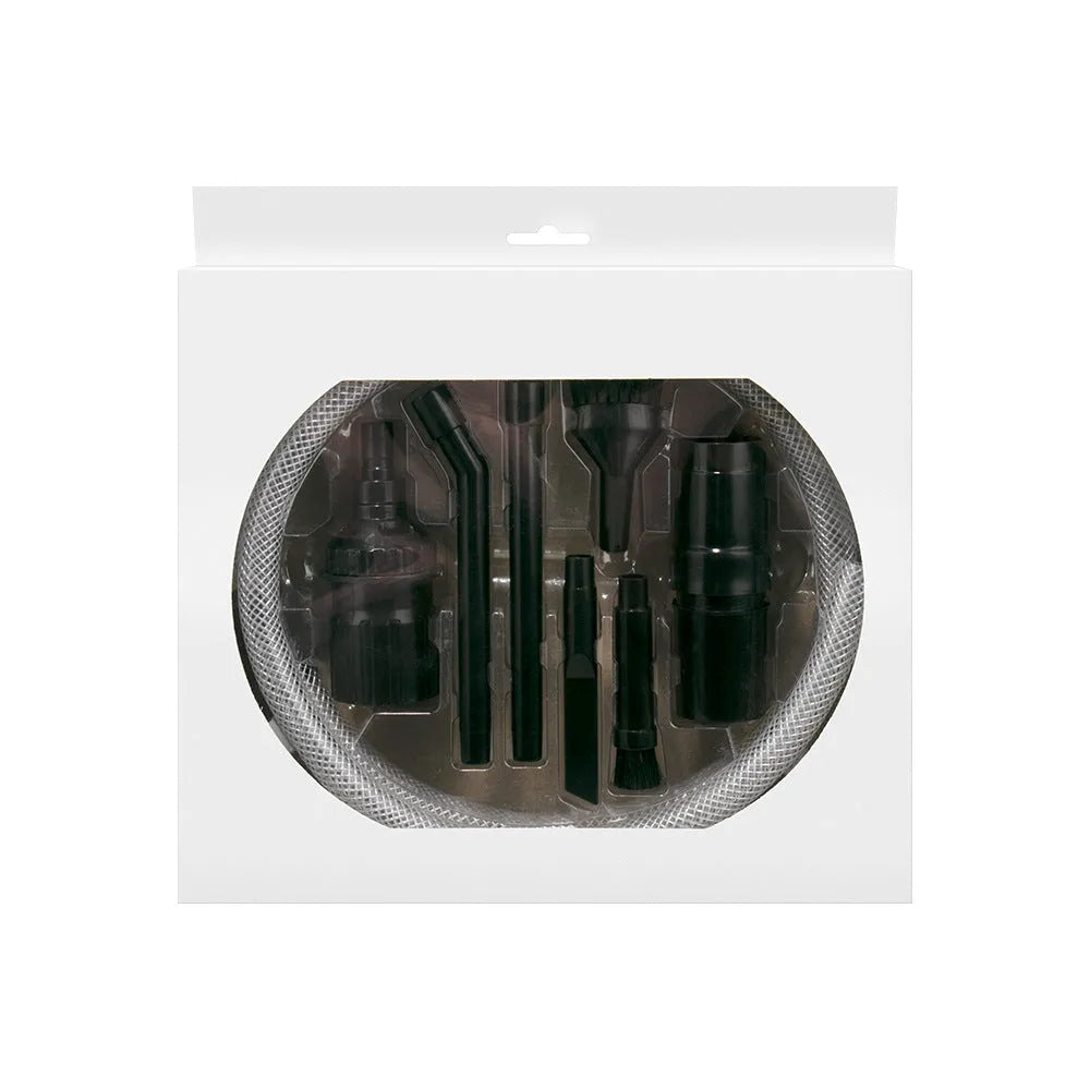 Eight-piece vacuum cleaner attachment set with various suction heads including floor brush and upholstery tool
