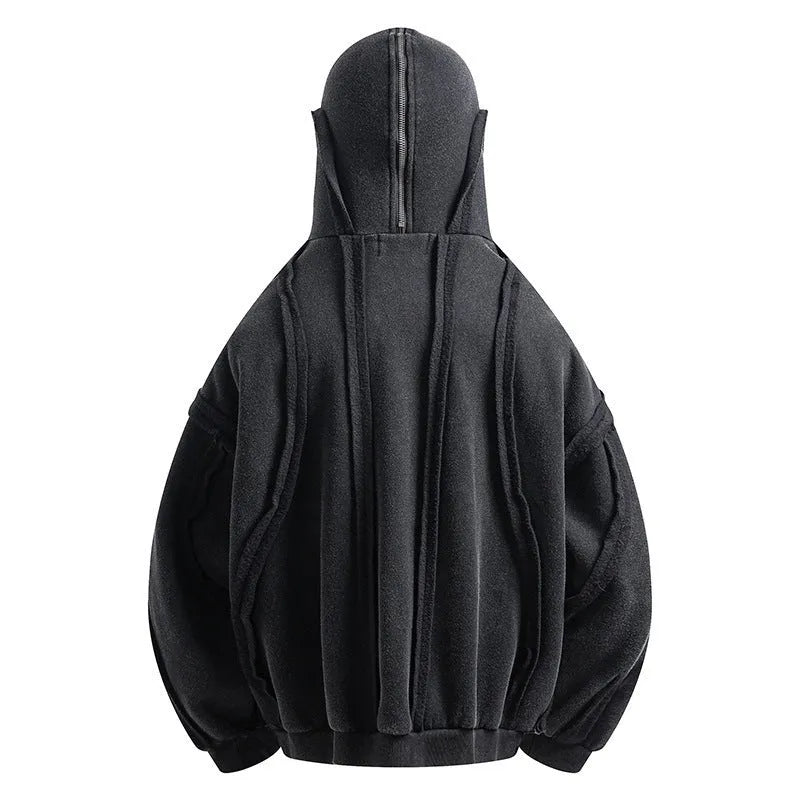 Black men's loose fit zip hooded coat with a retro abstract pattern, worn as a casual autumn jacket.