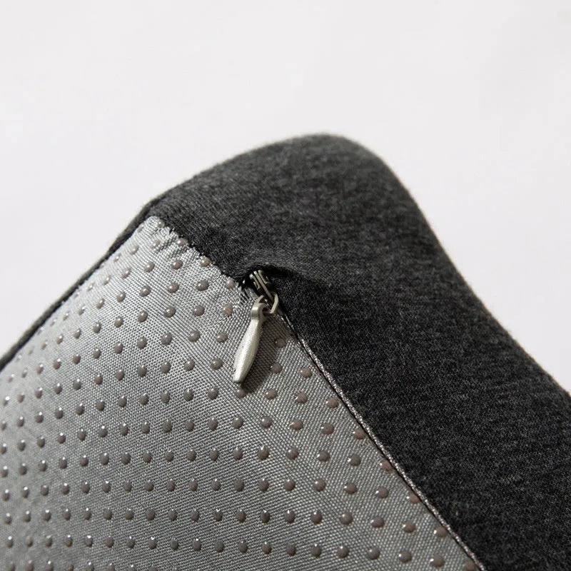 Black memory foam office chair cushion with dimensions 36x40cm on a grey desk chair