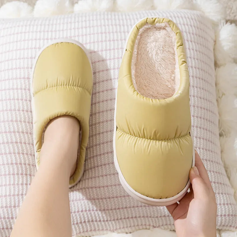 Blue plush indoor slippers with thick rubber sole and artificial fur lining
