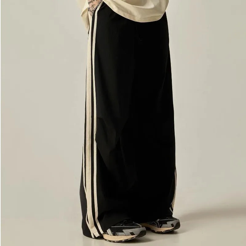 Black wide leg climbing trousers with high-waist design and straight leg cut for men