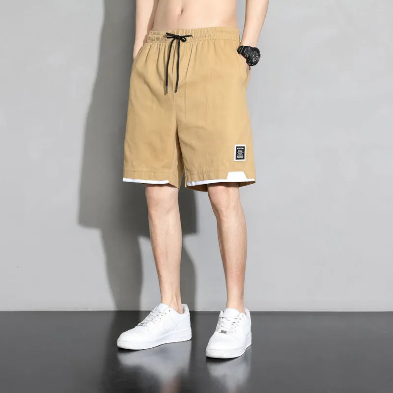 Japanese plus size cotton shorts for boys in black, khaki, and white colours with mid waist design
