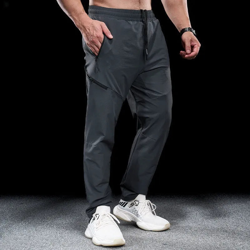 Men's waterproof quick-drying workout trousers in nylon fabric available in multiple colours and sizes