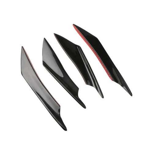 Set of four black ABS plastic bumper blade spoilers for car modification on a white background.