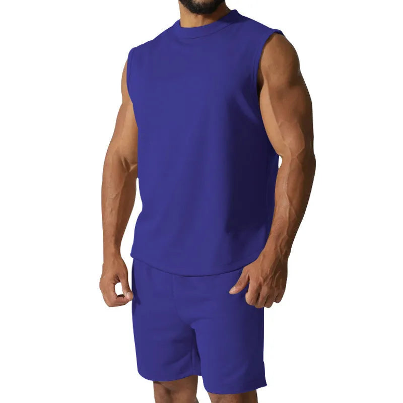 Men's sleeveless cotton blend sports top and shorts set in a solid colour.