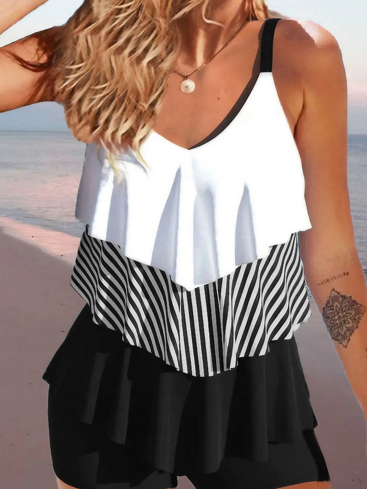 Women's backless bikini swimsuit with spaghetti straps and ruffle detailing