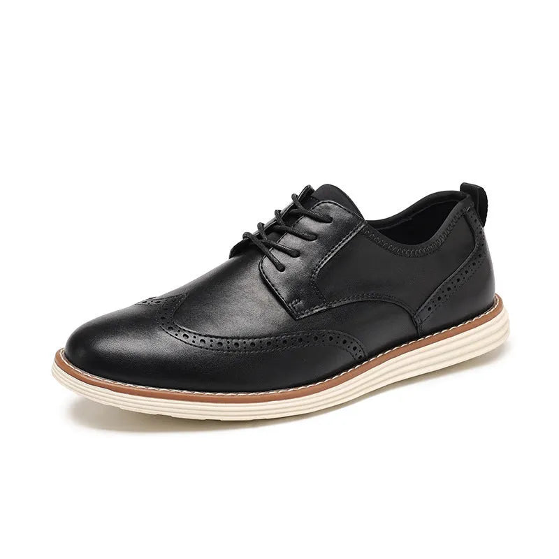 Men's black and brown slip-on business casual shoes with round toe and decorative carving detail
