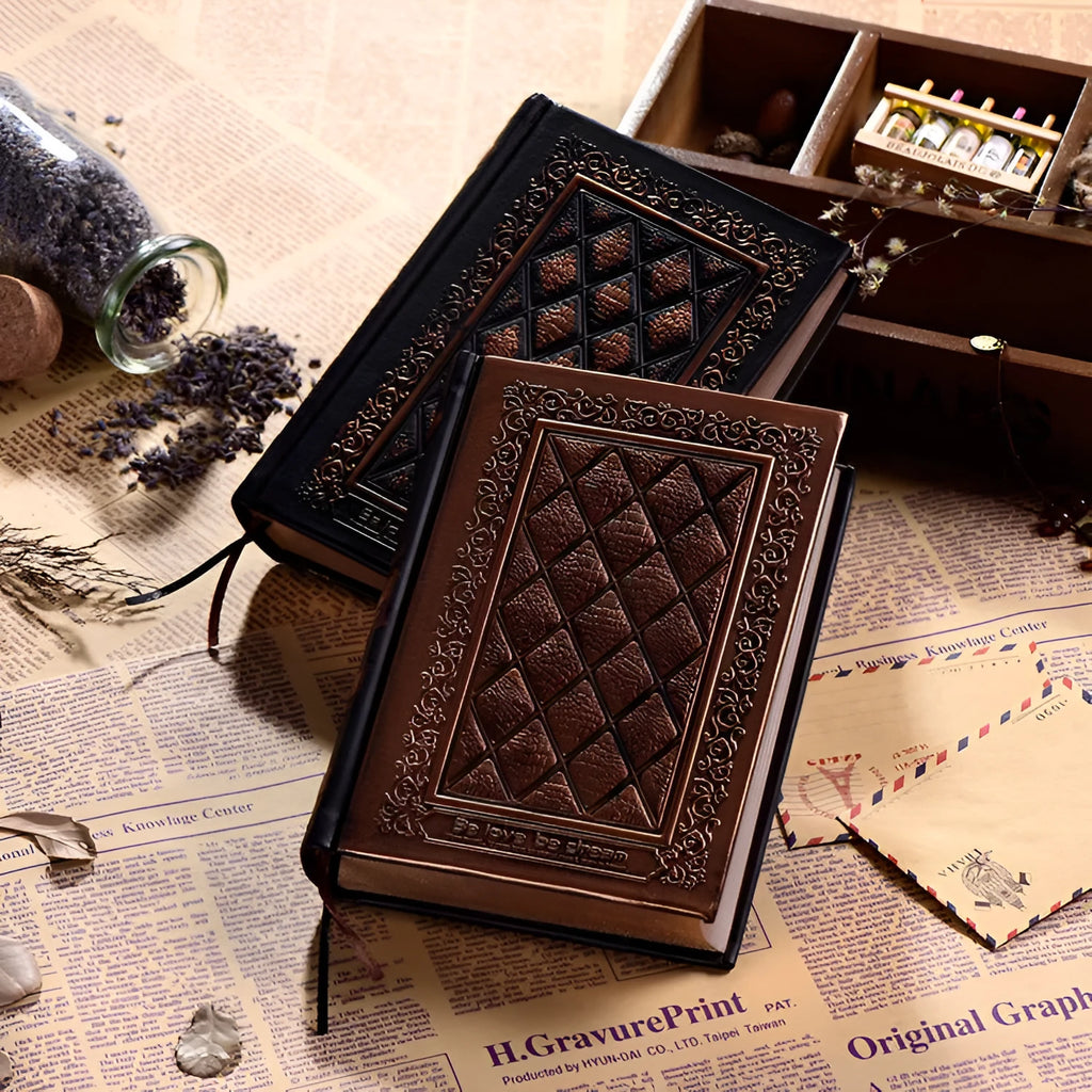 Embossed faux leather notepad in bronze colour option showing its textured cover and thick profile.