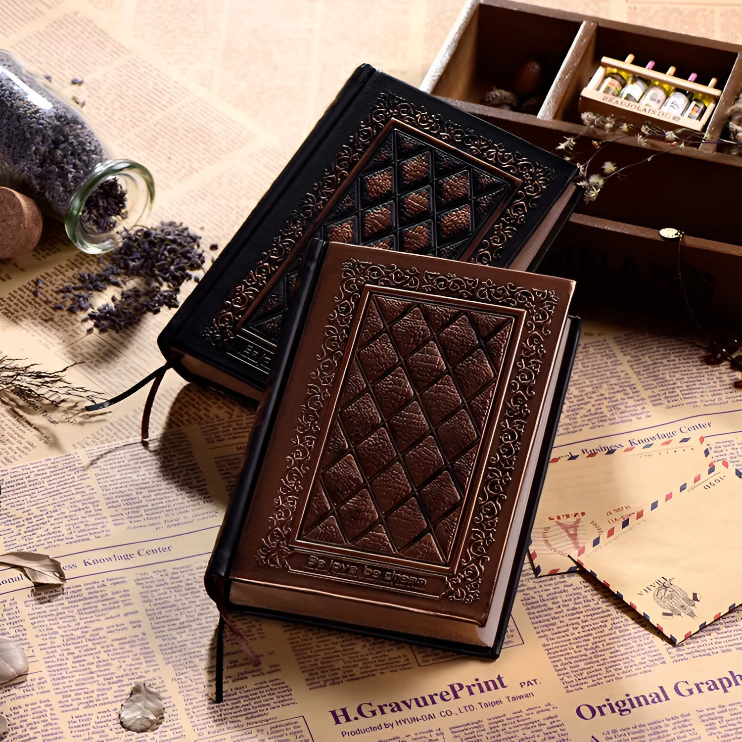 Embossed faux leather notepad in bronze colour option showing its textured cover and thick profile.
