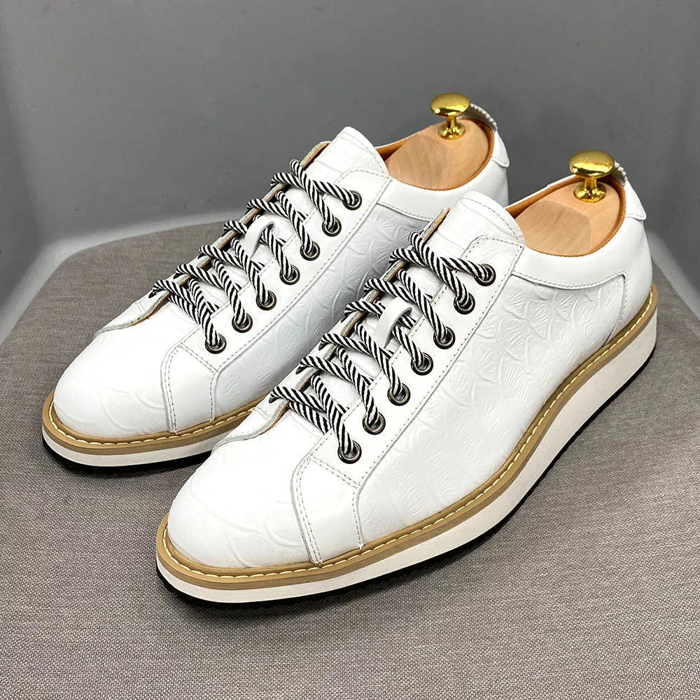 Men's handmade casual shoes with embossed pattern detailing and low tube front tie design