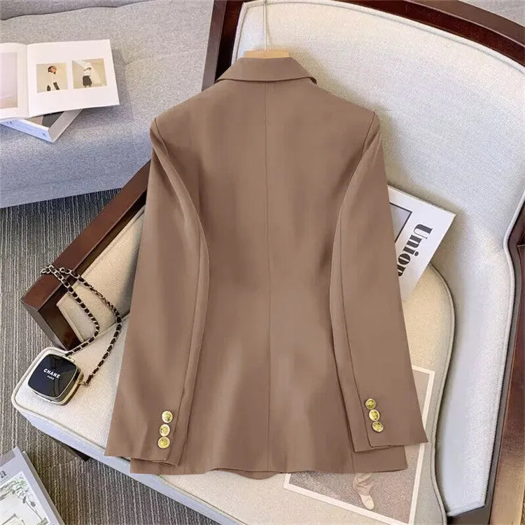 Loose-fit women's blouse in polyester fabric, available in black, white, khaki or pink, shown with regular sleeves.