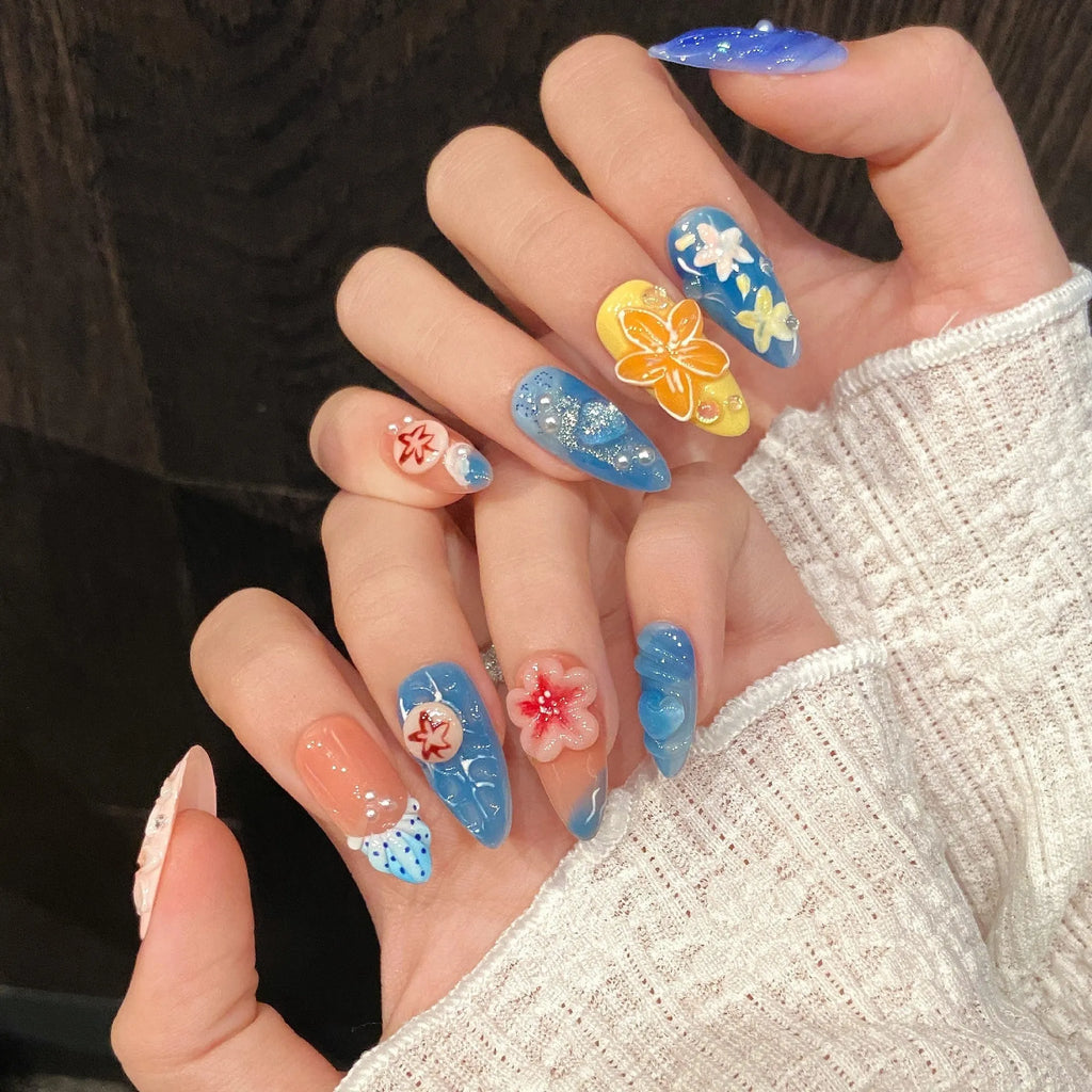 Three-dimensional carved jellyfish marine style wearable armour set in almond nail colour