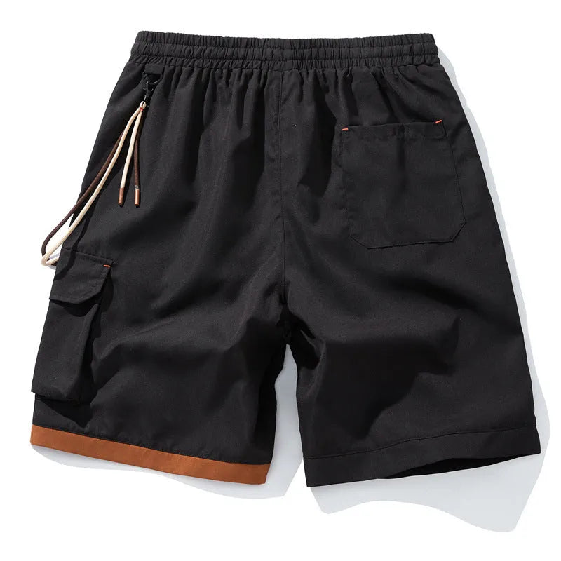 Man wearing loose-fit, high-waisted, cropped sports shorts in bamboo fibre.