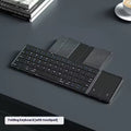 Black folding Bluetooth keyboard with touchpad unfolded showing full keyboard and touchpad surface
