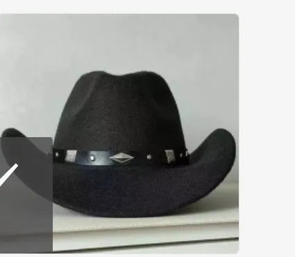 Brown leather velvet curved edge Western cowboy hat with a conical crown.