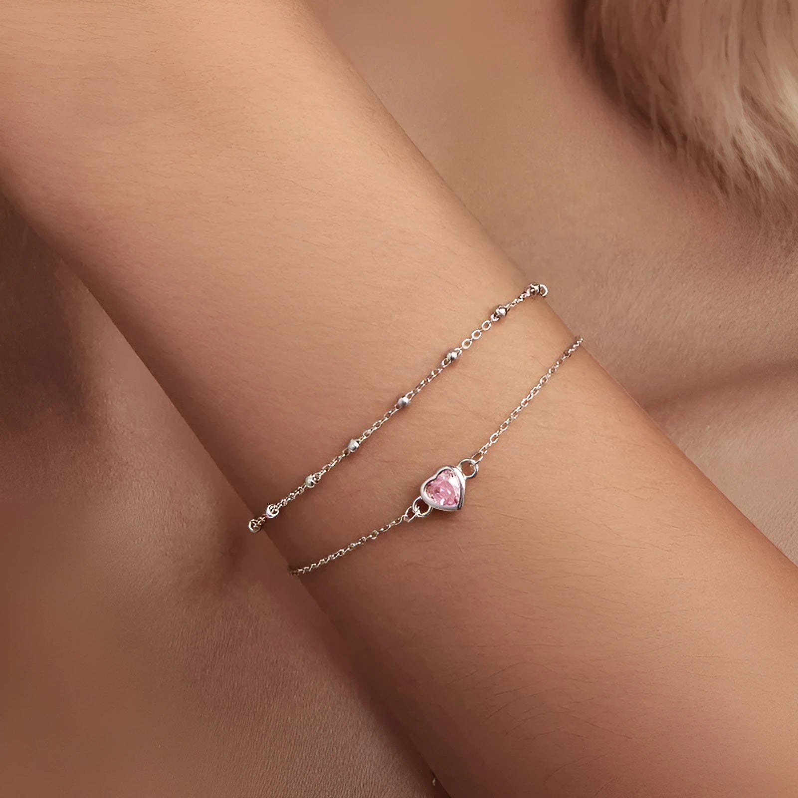 Sweet girlish style 925 sterling silver bracelet with a small heart-shaped charm on an adjustable chain.