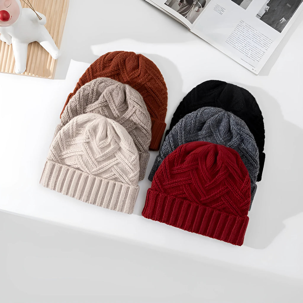 Women's wool knitted dome winter hat with a textured totem pattern.