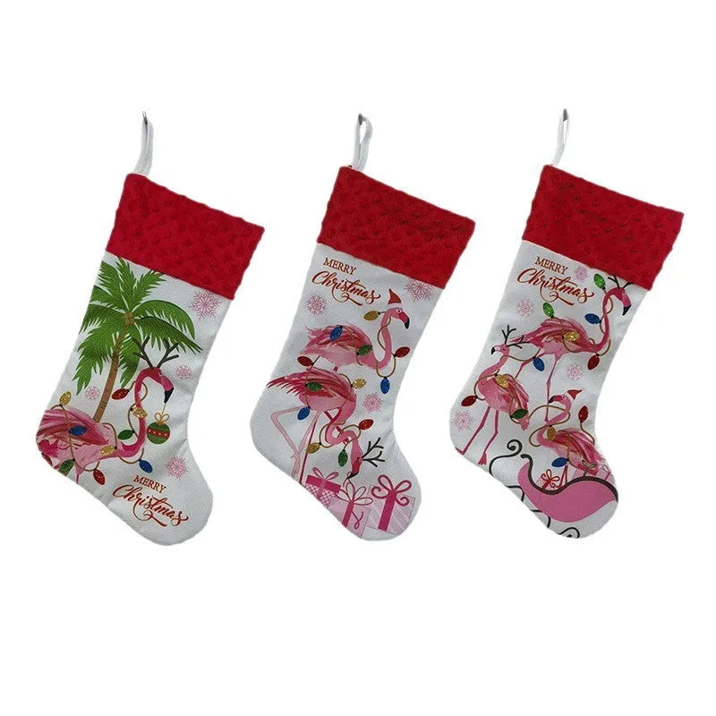 Flamingo Christmas stocking holiday decoration in cloth material measuring 46cm by 28cm