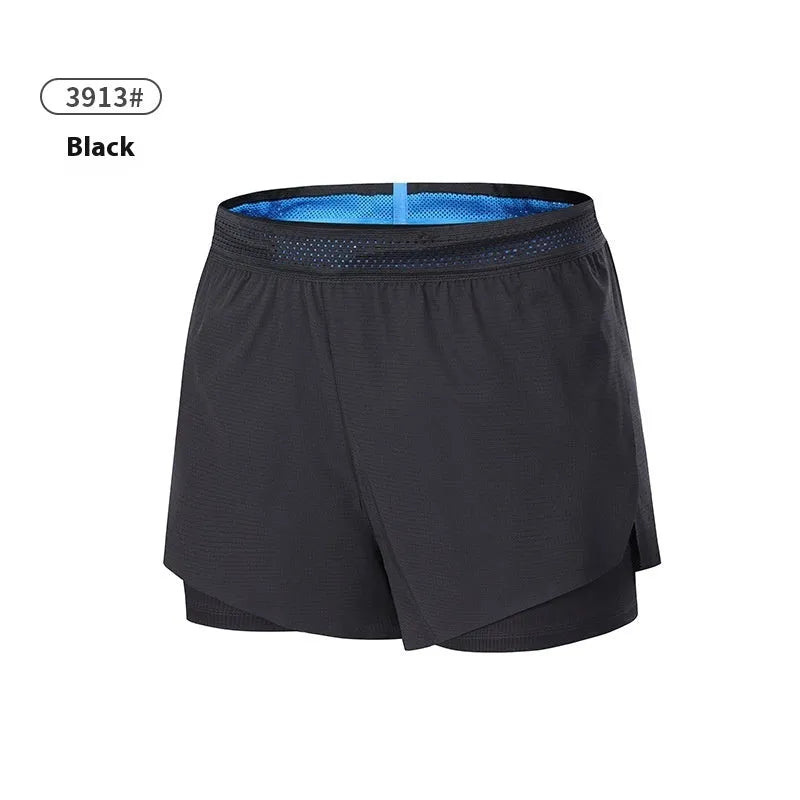 Men's solid colour low-waist basketball shorts made from polyester fabric.