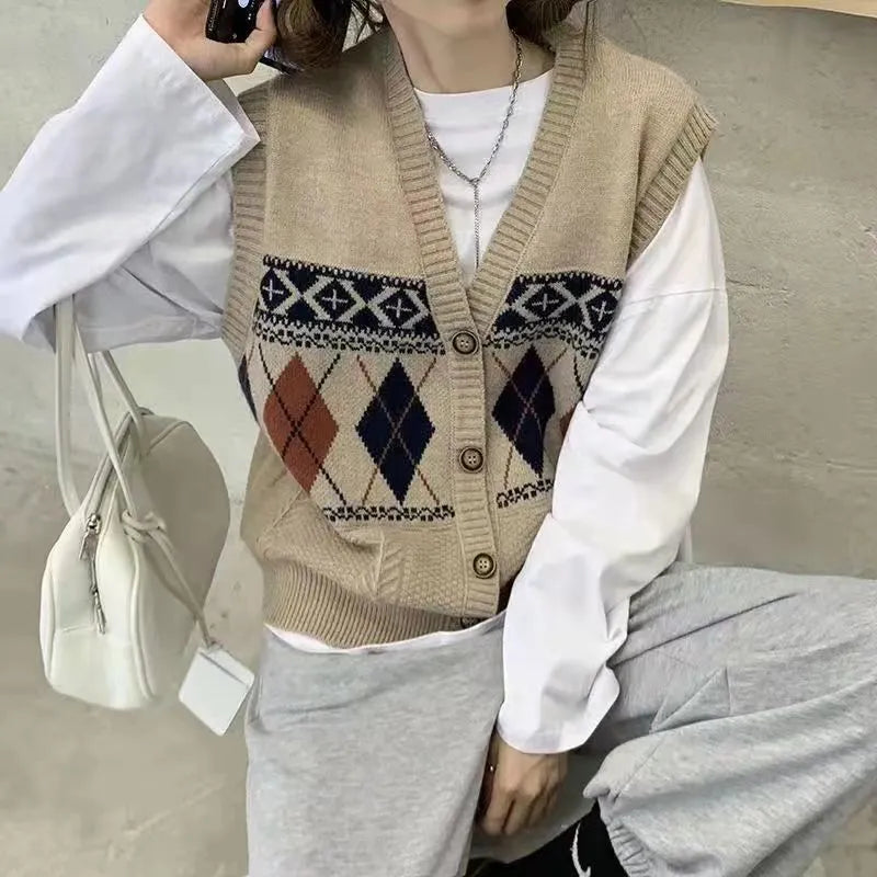 Loose-fit sleeveless cardigan with diamond plaid pattern in khaki, shown front view