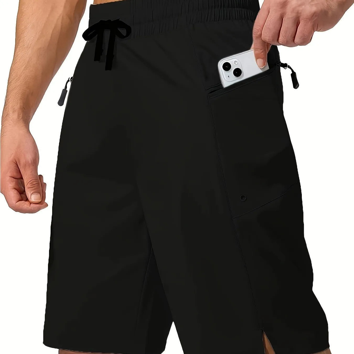 Man wearing solid grey quick-drying polyester beach shorts with a straight leg design.