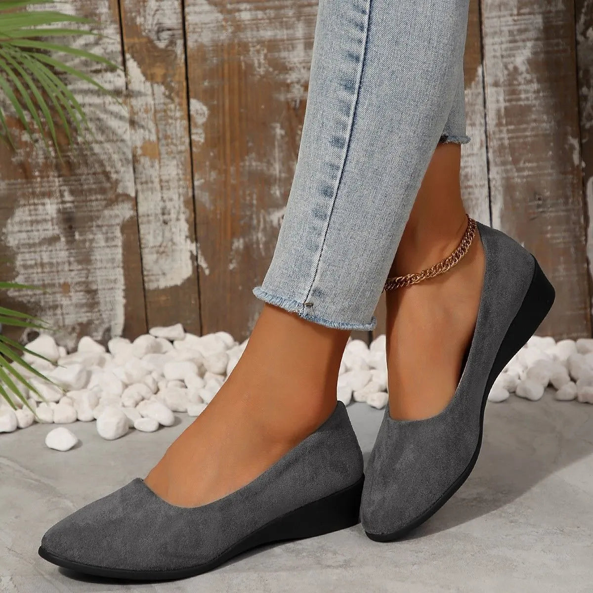 Women's pointed toe wedge pumps with suede upper and shallow mouth cut in light brown