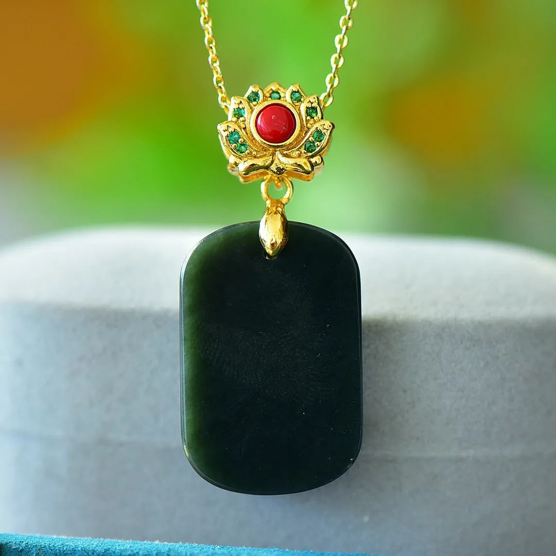 Gray Hetian jade pendant with copper inlay detailing on necklace chain