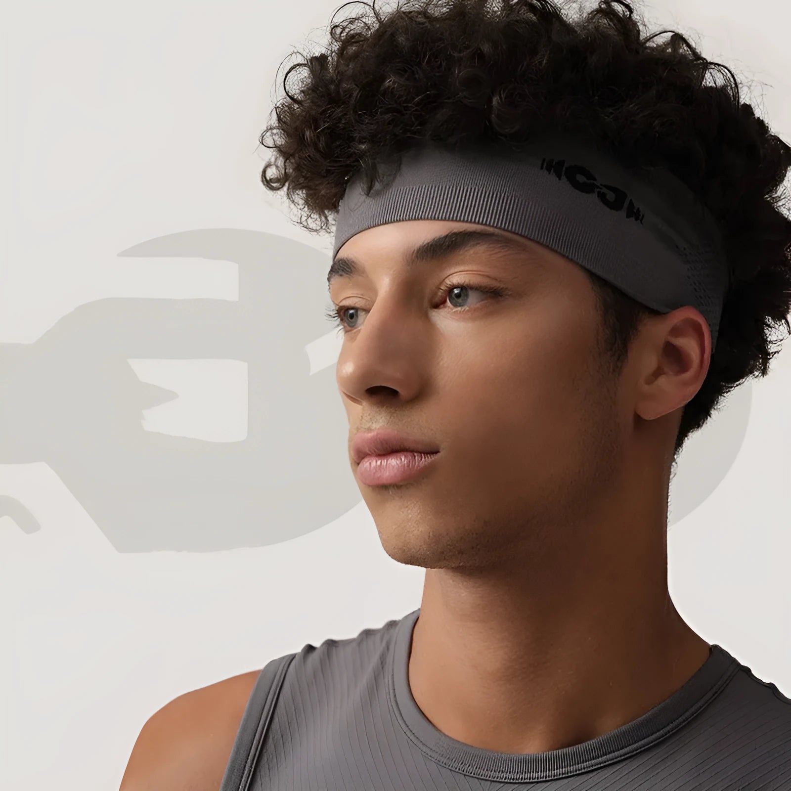 Seamless knitted exercise hair band in black, gray, and blue colours for sport