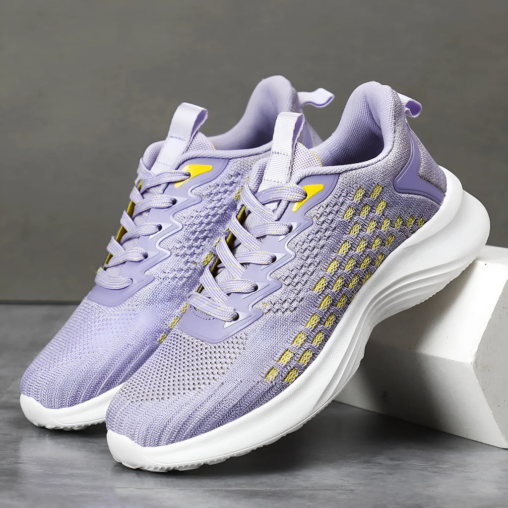 Women's lavender purple Flyknit running shoes with hollow elements and mesh lining