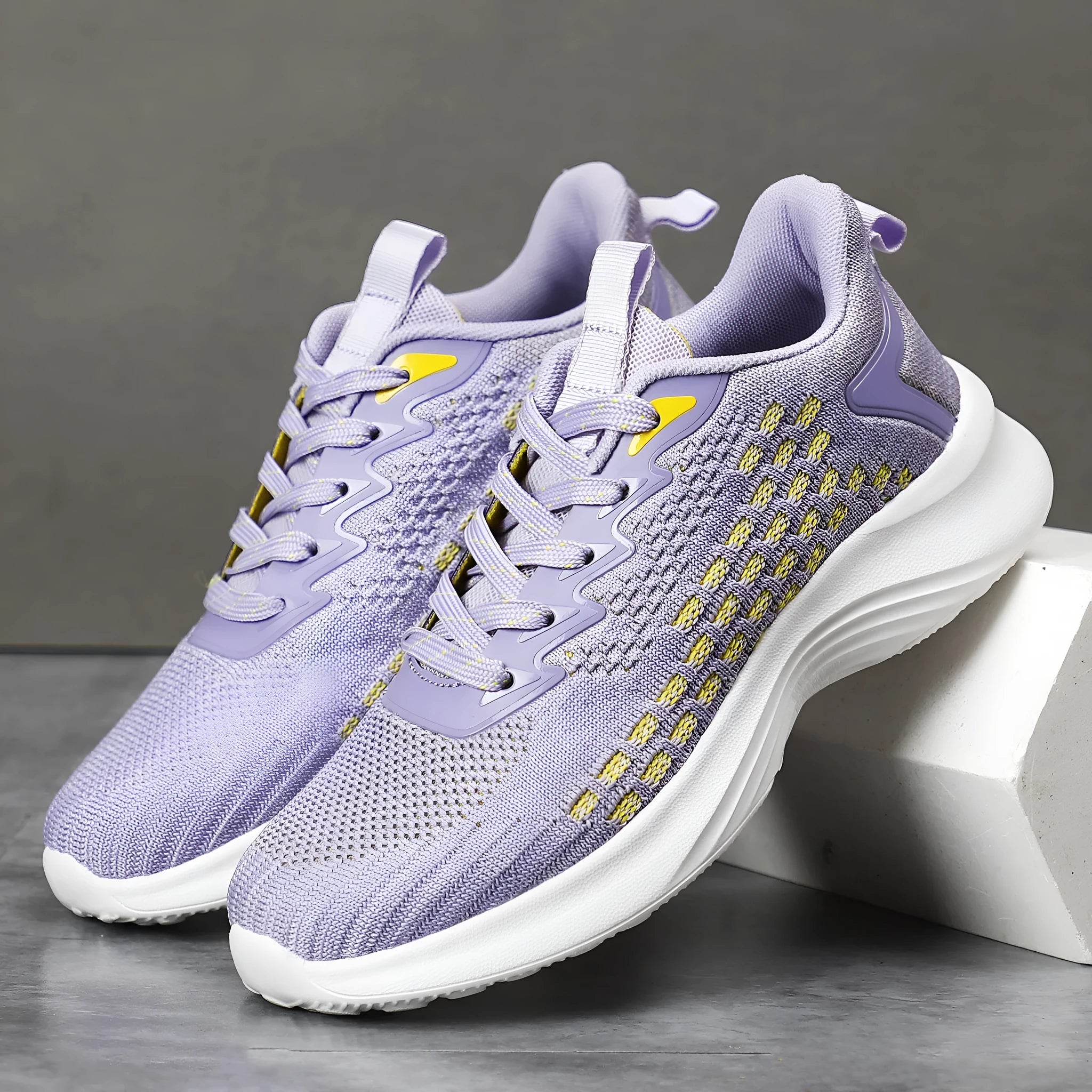 Women's lavender purple Flyknit running shoes with hollow elements and mesh lining