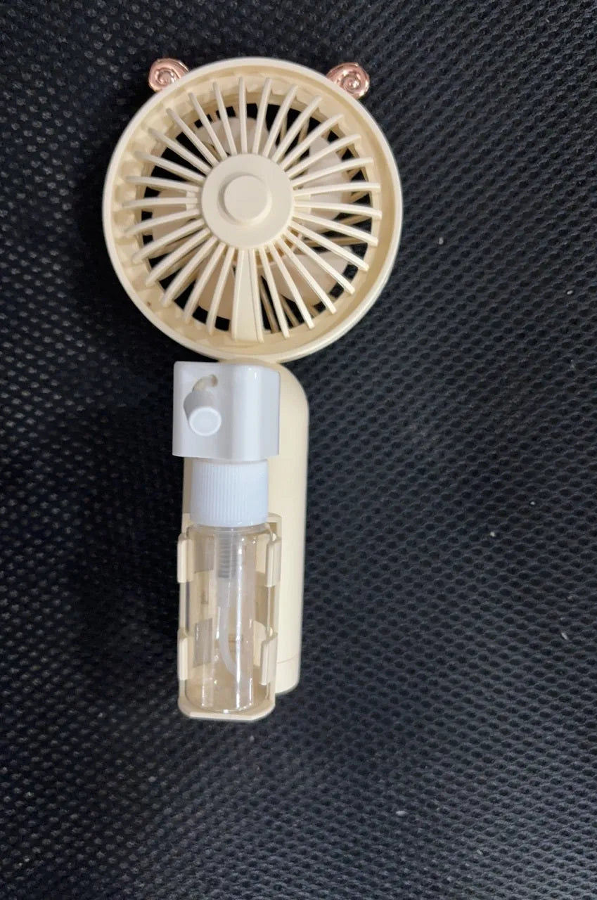 Colourful plastic USB rechargeable personal fan shown in apricot, blue, green, orange, and pink nozzle options.