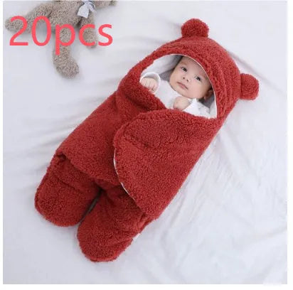 Cotton blend quilted baby sleeping bag wrapper in light blue, shown laid flat.