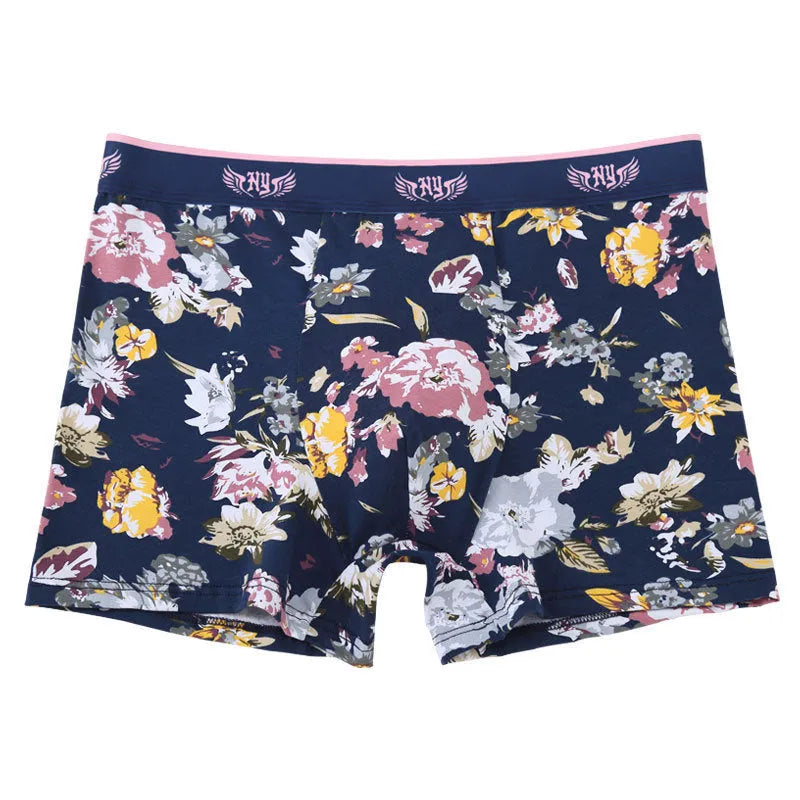 Men's cotton boxer shorts in a floral pattern, showing the mid-waist fit and U-shaped convex design.