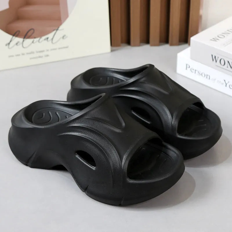 Women's thick-soled EVA slippers in rose red colour showing round toe design
