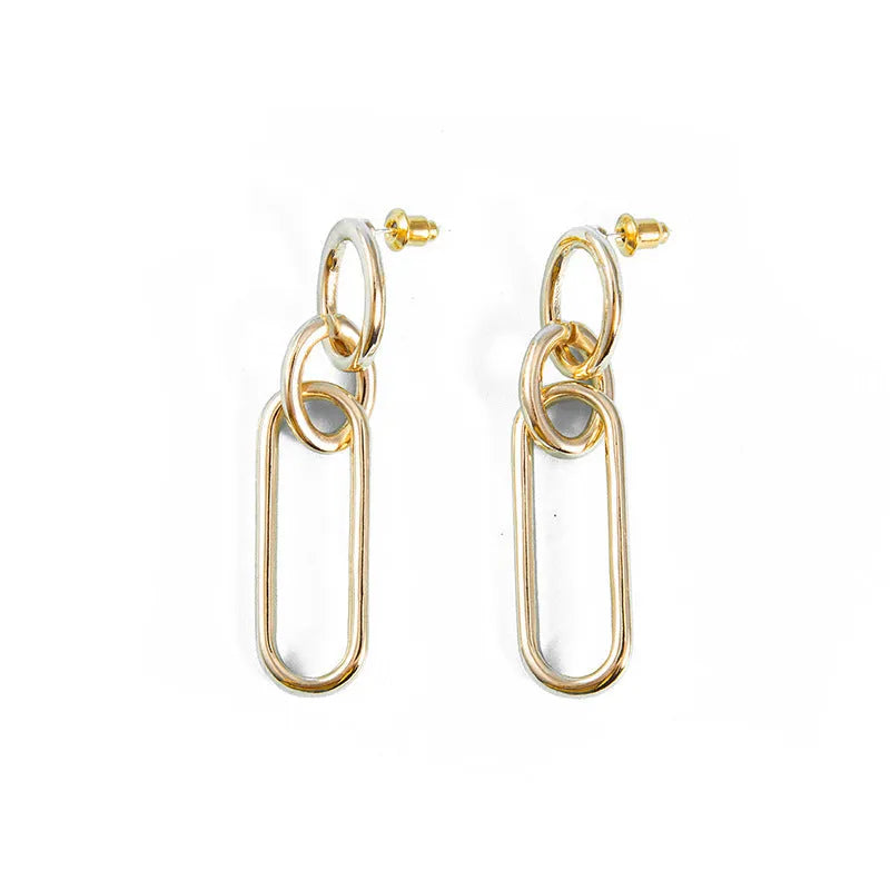 Sterling silver needle coloured geometric hoop earrings for women with ring and line design.