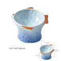 Four fish-shaped ceramic cat bowls in assorted colours with elevated design and tilted angle