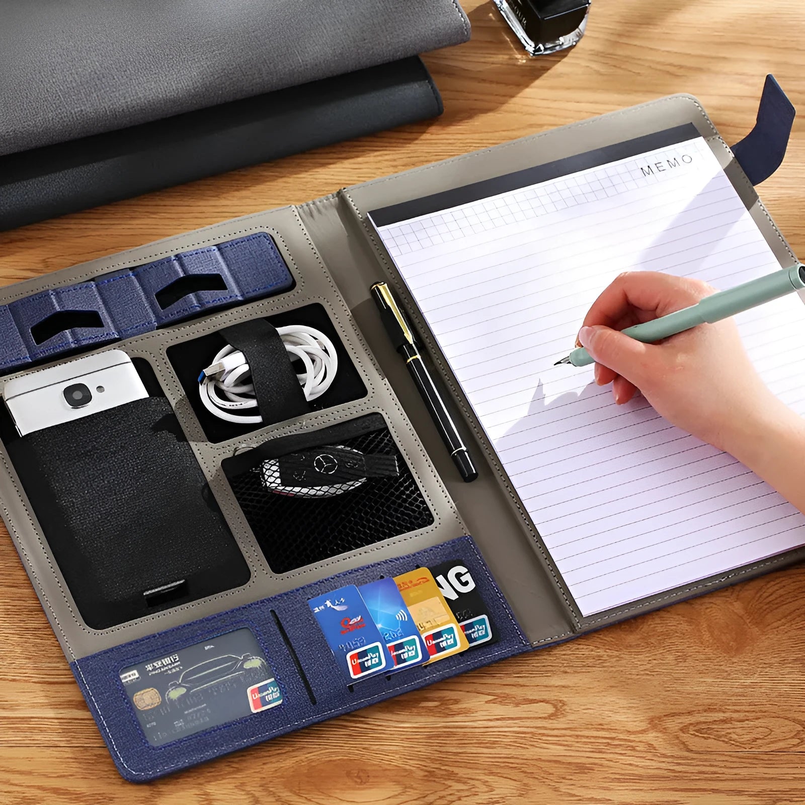 A4 leather business folder in black colour showing document storage and pen holder